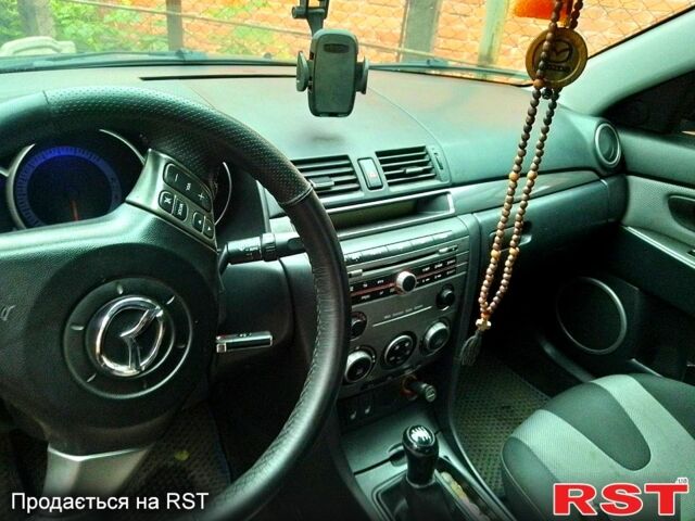 Синий Мазда 3, объемом двигателя 2 л и пробегом 258 тыс. км за 4500 $, фото 7 на Automoto.ua