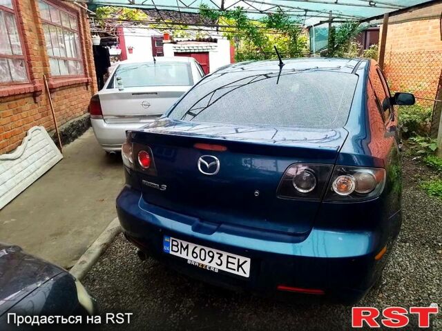 Синий Мазда 3, объемом двигателя 2 л и пробегом 258 тыс. км за 4500 $, фото 2 на Automoto.ua