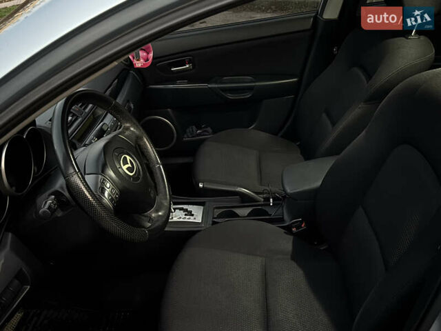 Синий Мазда 3, объемом двигателя 1.6 л и пробегом 144 тыс. км за 4950 $, фото 9 на Automoto.ua