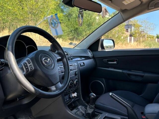 Синий Мазда 3, объемом двигателя 1.6 л и пробегом 190 тыс. км за 5201 $, фото 6 на Automoto.ua
