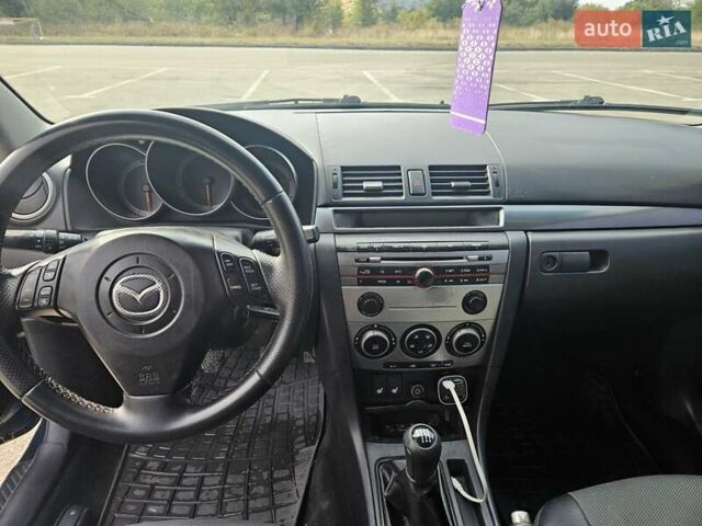 Синій Мазда 3, об'ємом двигуна 2 л та пробігом 301 тис. км за 5700 $, фото 13 на Automoto.ua
