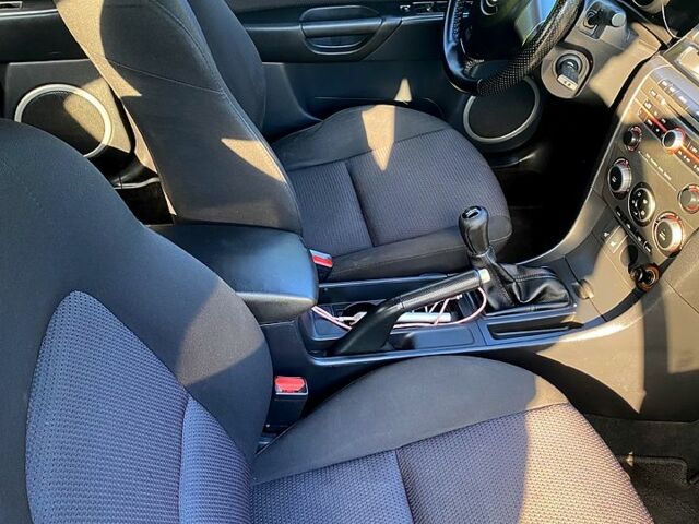 Синий Мазда 3, объемом двигателя 1.6 л и пробегом 237 тыс. км за 5300 $, фото 6 на Automoto.ua