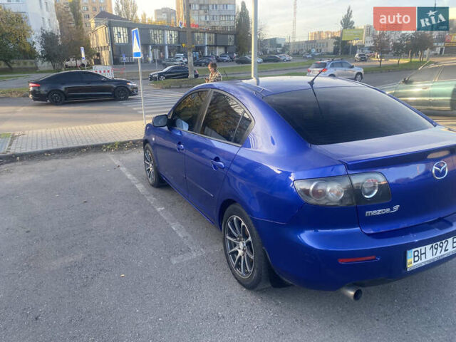 Синий Мазда 3, объемом двигателя 1.6 л и пробегом 197 тыс. км за 5500 $, фото 3 на Automoto.ua