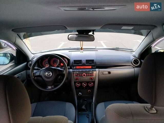 Синий Мазда 3, объемом двигателя 1.6 л и пробегом 219 тыс. км за 5000 $, фото 7 на Automoto.ua