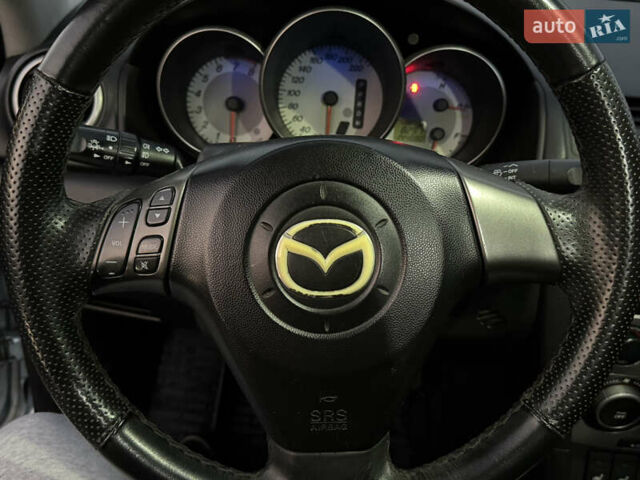 Синий Мазда 3, объемом двигателя 1.6 л и пробегом 144 тыс. км за 4950 $, фото 12 на Automoto.ua