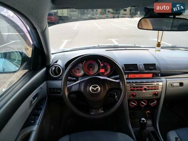 Синий Мазда 3, объемом двигателя 1.6 л и пробегом 219 тыс. км за 5000 $, фото 6 на Automoto.ua