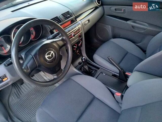 Синий Мазда 3, объемом двигателя 1.6 л и пробегом 219 тыс. км за 5000 $, фото 5 на Automoto.ua