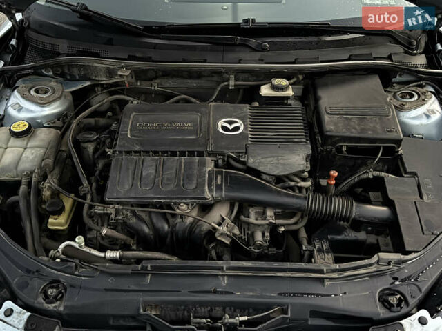 Синий Мазда 3, объемом двигателя 1.6 л и пробегом 144 тыс. км за 4950 $, фото 14 на Automoto.ua