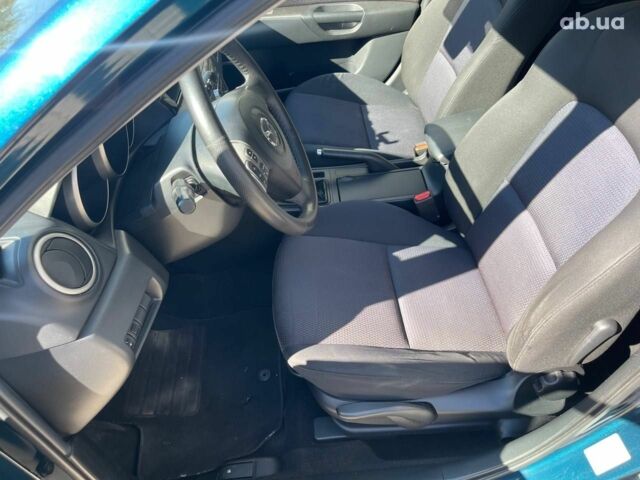 Синий Мазда 3, объемом двигателя 1.6 л и пробегом 190 тыс. км за 5650 $, фото 14 на Automoto.ua