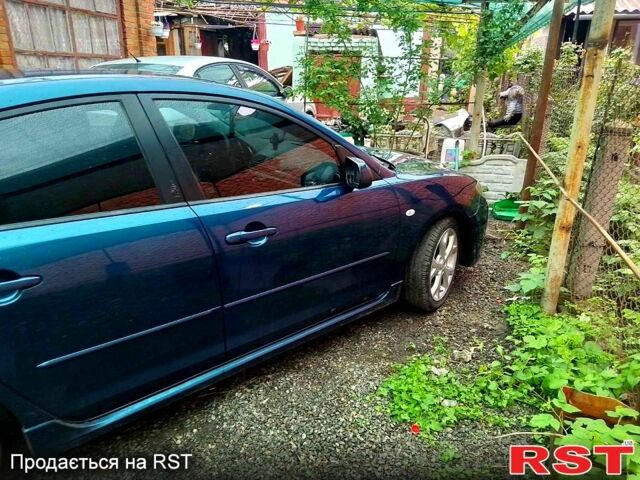 Синий Мазда 3, объемом двигателя 2 л и пробегом 258 тыс. км за 4500 $, фото 8 на Automoto.ua