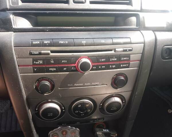 Синій Мазда 3, об'ємом двигуна 1.6 л та пробігом 213 тис. км за 4800 $, фото 6 на Automoto.ua