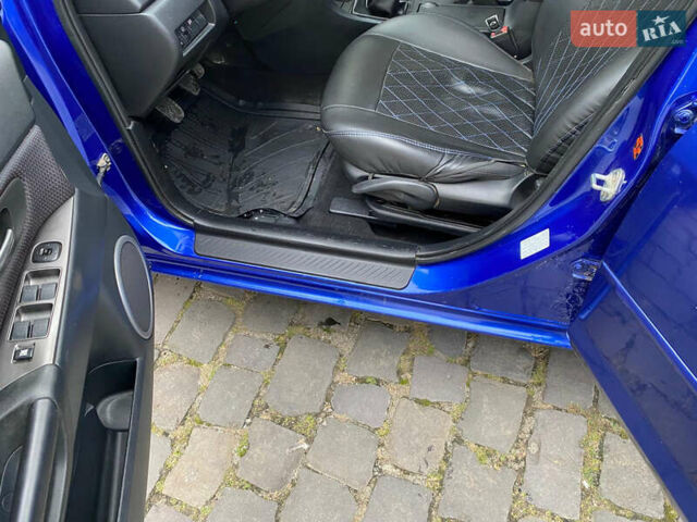 Синий Мазда 3, объемом двигателя 1.6 л и пробегом 214 тыс. км за 5200 $, фото 17 на Automoto.ua