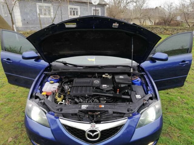 Синий Мазда 3, объемом двигателя 1.6 л и пробегом 197 тыс. км за 5000 $, фото 20 на Automoto.ua