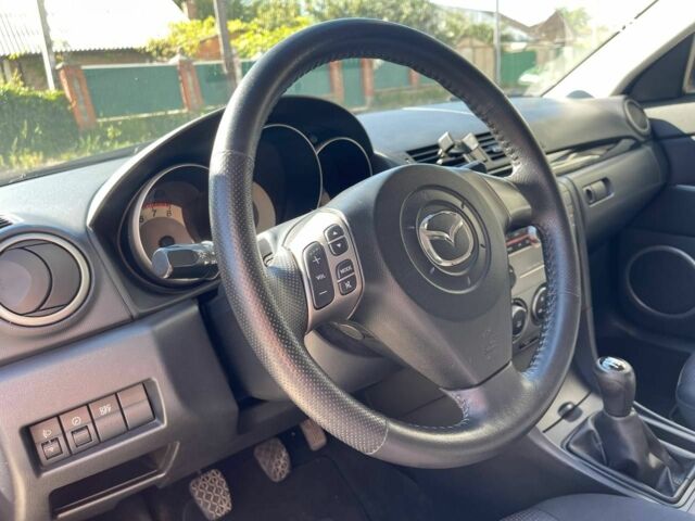 Синий Мазда 3, объемом двигателя 1.6 л и пробегом 190 тыс. км за 5650 $, фото 15 на Automoto.ua