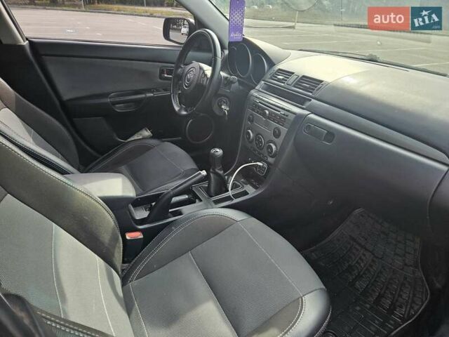 Синій Мазда 3, об'ємом двигуна 2 л та пробігом 301 тис. км за 5700 $, фото 11 на Automoto.ua