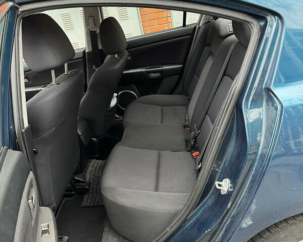 Синій Мазда 3, об'ємом двигуна 1.6 л та пробігом 181 тис. км за 6490 $, фото 3 на Automoto.ua