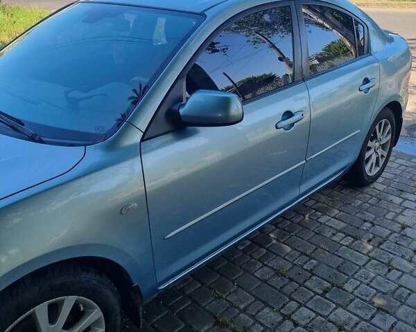 Синій Мазда 3, об'ємом двигуна 1.6 л та пробігом 150 тис. км за 5500 $, фото 3 на Automoto.ua
