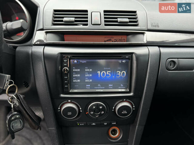 Синій Мазда 3, об'ємом двигуна 1.6 л та пробігом 175 тис. км за 5300 $, фото 29 на Automoto.ua