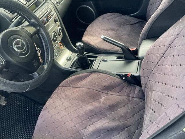 Синий Мазда 3, объемом двигателя 2 л и пробегом 200 тыс. км за 4000 $, фото 9 на Automoto.ua