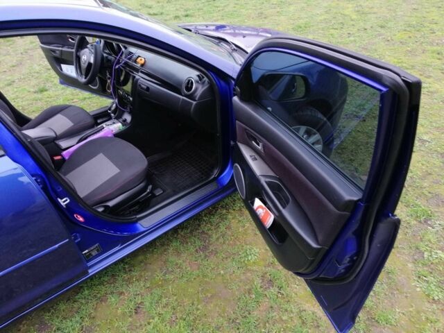 Синий Мазда 3, объемом двигателя 1.6 л и пробегом 197 тыс. км за 5000 $, фото 13 на Automoto.ua