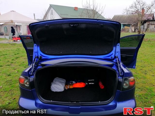 Синий Мазда 3, объемом двигателя 1.6 л и пробегом 197 тыс. км за 4980 $, фото 8 на Automoto.ua