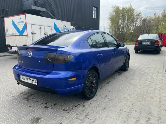 Синий Мазда 3, объемом двигателя 2 л и пробегом 211 тыс. км за 2200 $, фото 3 на Automoto.ua