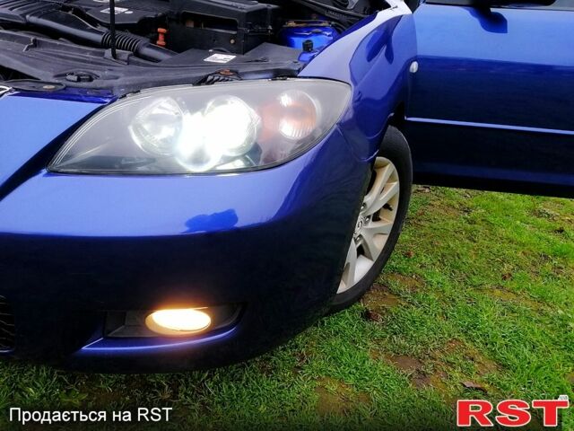 Синий Мазда 3, объемом двигателя 1.6 л и пробегом 197 тыс. км за 4980 $, фото 10 на Automoto.ua