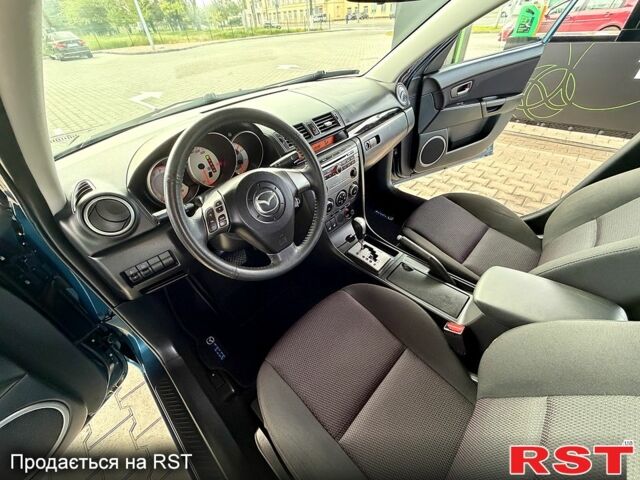 Синий Мазда 3, объемом двигателя 1.6 л и пробегом 85 тыс. км за 8000 $, фото 12 на Automoto.ua