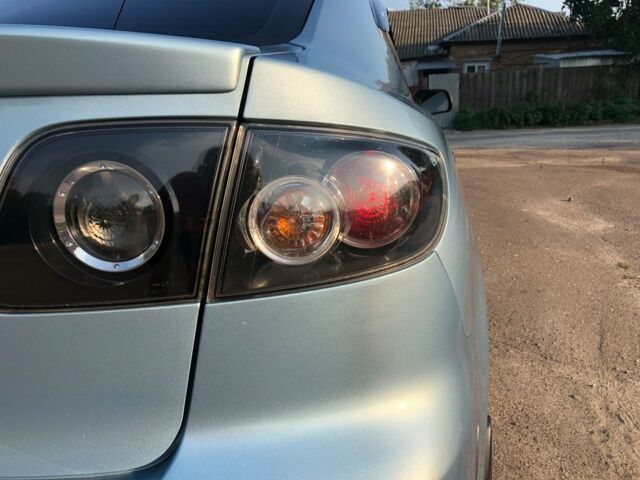 Синій Мазда 3, об'ємом двигуна 1.6 л та пробігом 125 тис. км за 7500 $, фото 5 на Automoto.ua