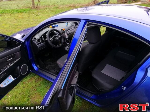 Синий Мазда 3, объемом двигателя 1.6 л и пробегом 197 тыс. км за 4980 $, фото 4 на Automoto.ua