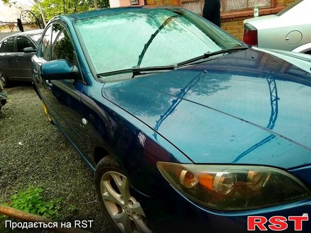 Синий Мазда 3, объемом двигателя 2 л и пробегом 258 тыс. км за 4500 $, фото 5 на Automoto.ua