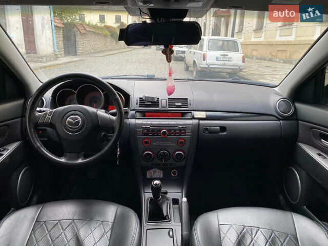 Синий Мазда 3, объемом двигателя 1.6 л и пробегом 214 тыс. км за 5200 $, фото 21 на Automoto.ua