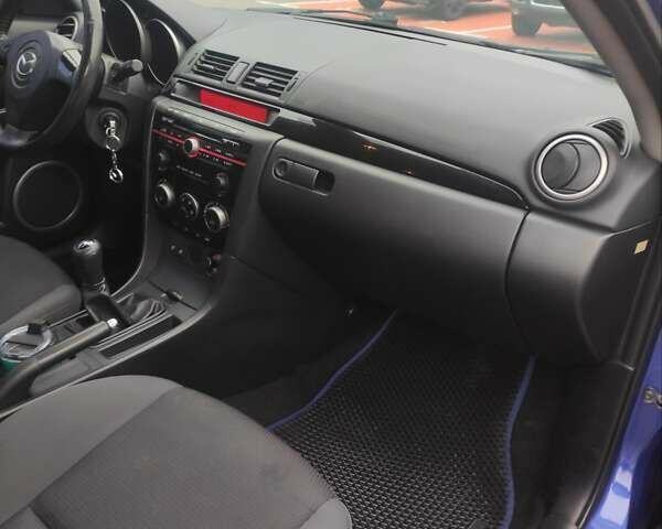 Синий Мазда 3, объемом двигателя 1.6 л и пробегом 234 тыс. км за 5300 $, фото 22 на Automoto.ua