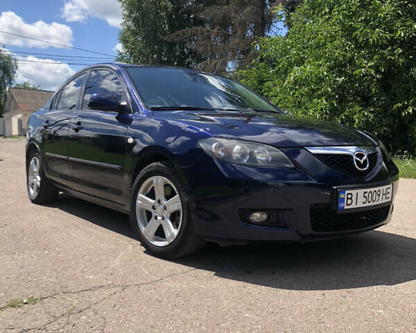 Синий Мазда 3, объемом двигателя 2 л и пробегом 200 тыс. км за 6500 $, фото 2 на Automoto.ua