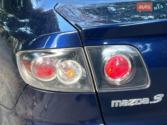 Синий Мазда 3, объемом двигателя 1.6 л и пробегом 170 тыс. км за 6490 $, фото 11 на Automoto.ua