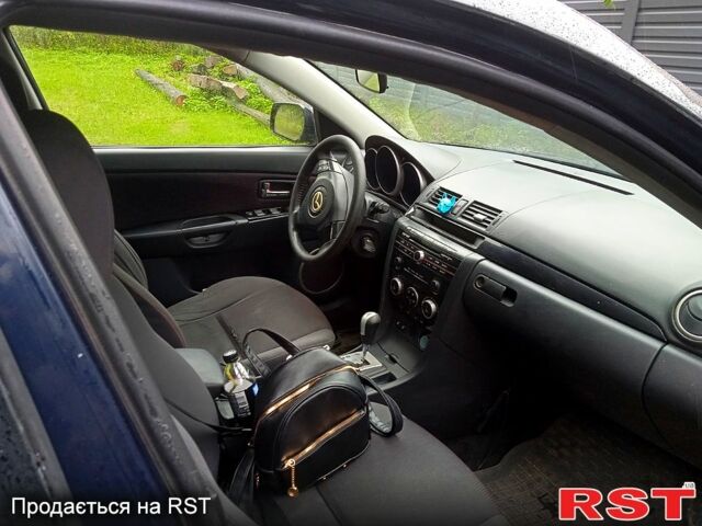 Синий Мазда 3, объемом двигателя 1.6 л и пробегом 330 тыс. км за 3200 $, фото 4 на Automoto.ua