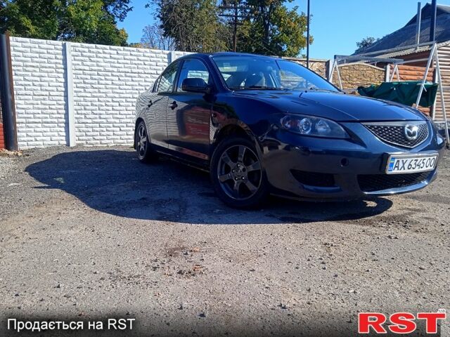 Синий Мазда 3, объемом двигателя 1.6 л и пробегом 330 тыс. км за 3200 $, фото 1 на Automoto.ua