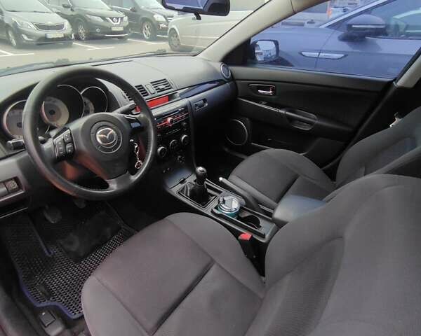 Синий Мазда 3, объемом двигателя 1.6 л и пробегом 234 тыс. км за 5300 $, фото 25 на Automoto.ua