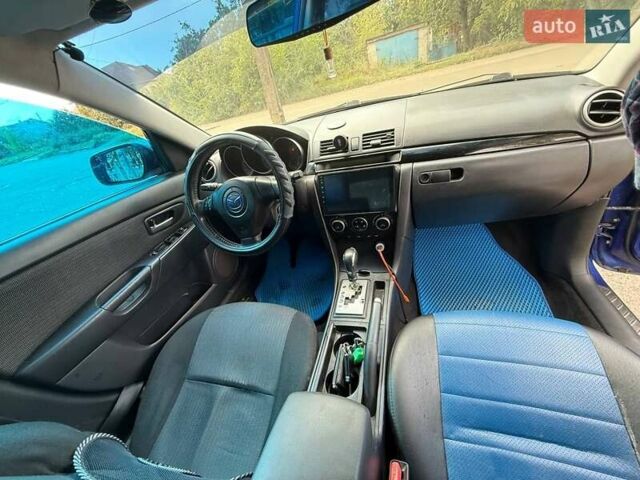 Синий Мазда 3, объемом двигателя 1.6 л и пробегом 237 тыс. км за 5300 $, фото 6 на Automoto.ua