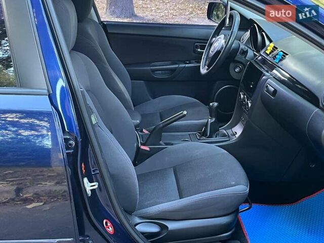 Синий Мазда 3, объемом двигателя 1.6 л и пробегом 170 тыс. км за 6490 $, фото 16 на Automoto.ua