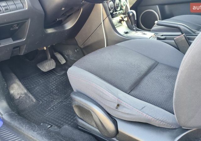 Синий Мазда 3, объемом двигателя 1.6 л и пробегом 195 тыс. км за 5500 $, фото 24 на Automoto.ua