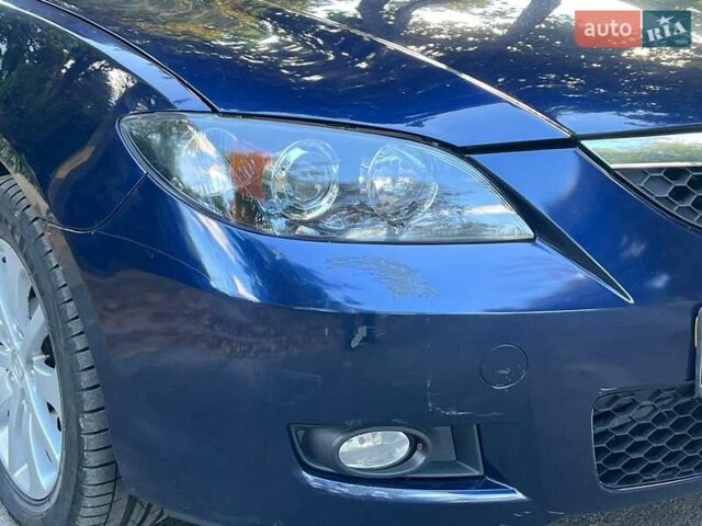 Синий Мазда 3, объемом двигателя 1.6 л и пробегом 170 тыс. км за 6490 $, фото 1 на Automoto.ua