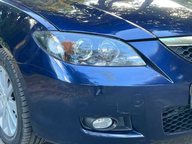 Синій Мазда 3, об'ємом двигуна 1.6 л та пробігом 170 тис. км за 6490 $, фото 3 на Automoto.ua