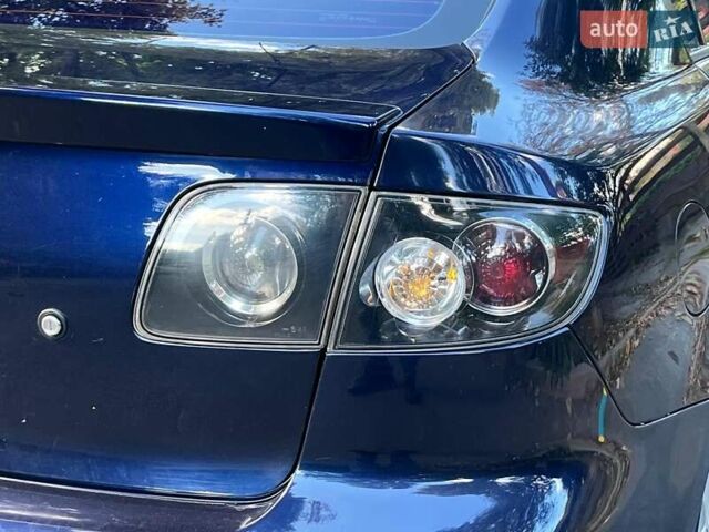 Синий Мазда 3, объемом двигателя 1.6 л и пробегом 170 тыс. км за 6490 $, фото 10 на Automoto.ua