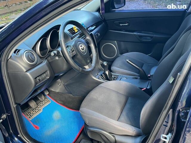 Синий Мазда 3, объемом двигателя 1.6 л и пробегом 170 тыс. км за 6490 $, фото 24 на Automoto.ua