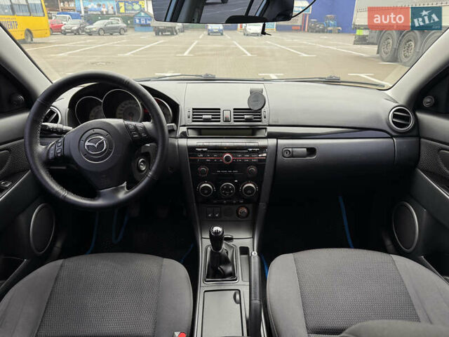 Синий Мазда 3, объемом двигателя 1.6 л и пробегом 154 тыс. км за 5500 $, фото 14 на Automoto.ua