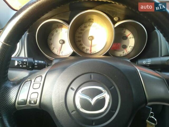 Синий Мазда 3, объемом двигателя 1.6 л и пробегом 182 тыс. км за 5200 $, фото 11 на Automoto.ua