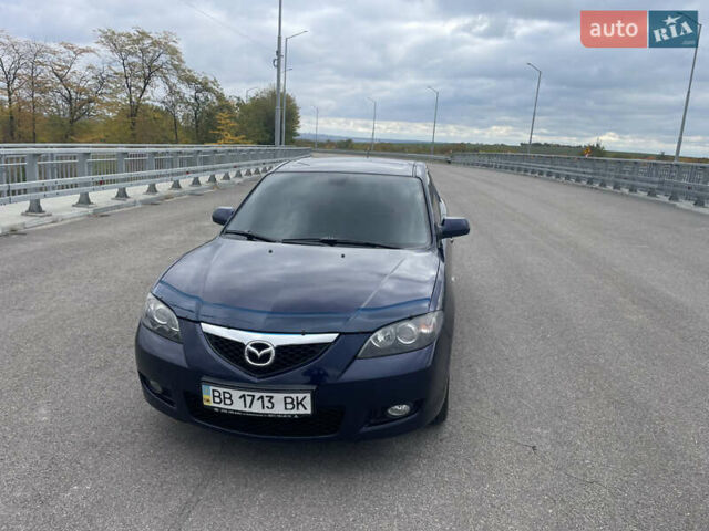 Синий Мазда 3, объемом двигателя 1.6 л и пробегом 187 тыс. км за 6100 $, фото 1 на Automoto.ua
