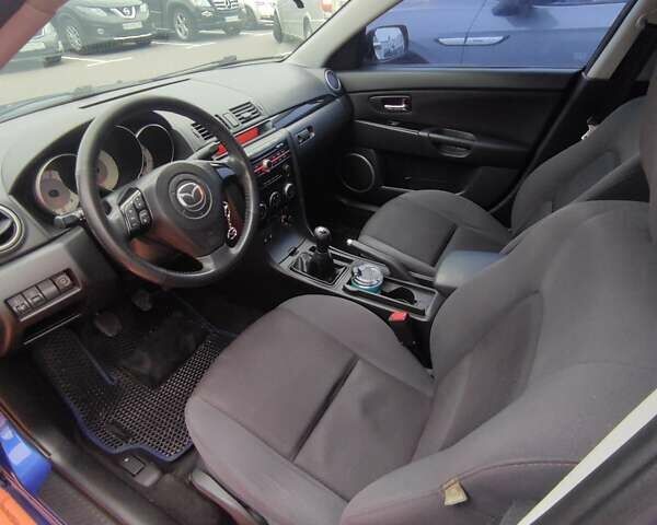 Синий Мазда 3, объемом двигателя 1.6 л и пробегом 234 тыс. км за 5300 $, фото 24 на Automoto.ua