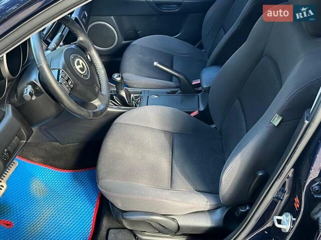 Синий Мазда 3, объемом двигателя 1.6 л и пробегом 170 тыс. км за 6490 $, фото 30 на Automoto.ua